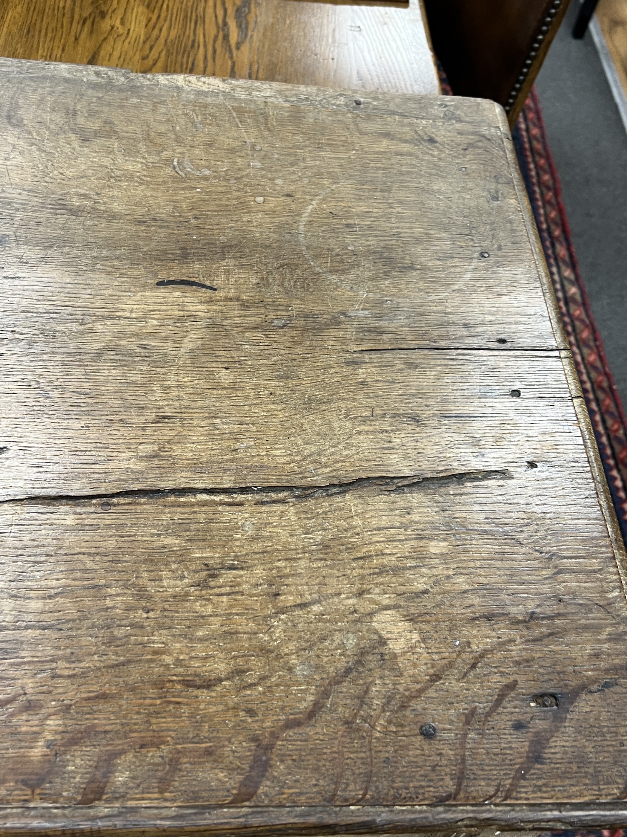 An 18th century geometric moulded oak chest of drawers, width 98cm, depth 57cm, height 92cm